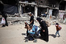 Palestinians Flee The Shuja'iyya Neighborhood
