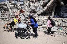 Palestinians Flee The Shuja'iyya Neighborhood