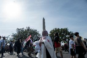 Pro-Palestinian protestors march from the National Gallery to ICE Headquarters in Washington, DC, on Saturday April 5, 2025. Thi