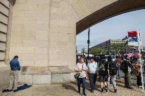 Pro-Palestinian protestors march from the National Gallery to ICE Headquarters in Washington, DC, on Saturday April 5, 2025. Thi