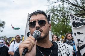 Pro-Palestinian protestors march from the National Gallery to ICE Headquarters in Washington, DC, on Saturday April 5, 2025. Thi