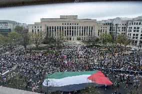 Pro-Palestinian protestors march from the National Gallery to ICE Headquarters in Washington, DC, on Saturday April 5, 2025. Thi