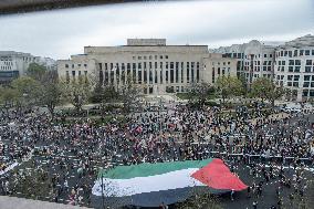 Pro-Palestinian protestors march from the National Gallery to ICE Headquarters in Washington, DC, on Saturday April 5, 2025. Thi