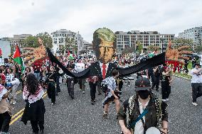 Pro-Palestinian protestors march from the National Gallery to ICE Headquarters in Washington, DC, on Saturday April 5, 2025. Thi
