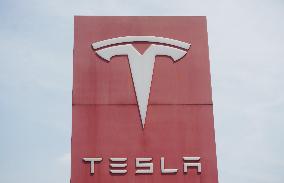 Tesla Shares Fall As Tariffs Hit