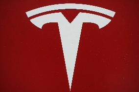 Tesla Shares Fall As Tariffs Hit