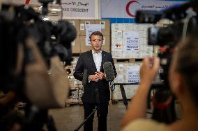 Macron talks to the media during a visit at Egyptian Red Crescent - Egypt