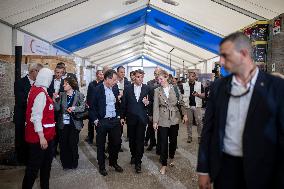 Macron talks to the media during a visit at Egyptian Red Crescent - Egypt