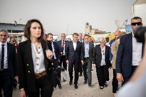 Macron talks to the media during a visit at Egyptian Red Crescent - Egypt