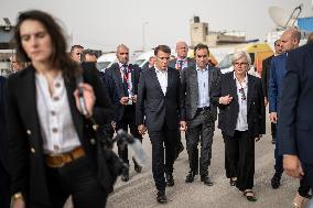 Macron talks to the media during a visit at Egyptian Red Crescent - Egypt