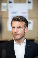 Macron talks to the media during a visit at Egyptian Red Crescent - Egypt