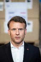 Macron talks to the media during a visit at Egyptian Red Crescent - Egypt