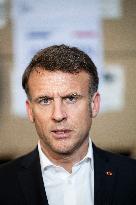 Macron talks to the media during a visit at Egyptian Red Crescent - Egypt