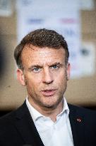 Macron talks to the media during a visit at Egyptian Red Crescent - Egypt