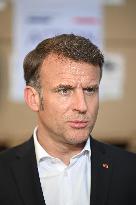 Macron talks to the media during a visit at Egyptian Red Crescent - Egypt
