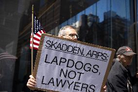 Protesters Demonstrate Outside Elite Law Firm Over Deal With Trump