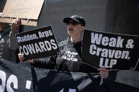 Protesters Demonstrate Outside Elite Law Firm Over Deal With Trump