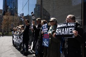 Protesters Demonstrate Outside Elite Law Firm Over Deal With Trump