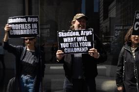 Protesters Demonstrate Outside Elite Law Firm Over Deal With Trump
