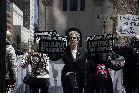 Protesters Demonstrate Outside Elite Law Firm Over Deal With Trump