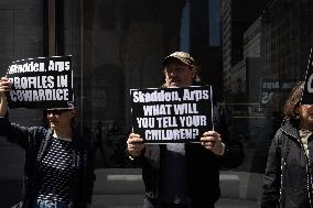 Protesters Demonstrate Outside Elite Law Firm Over Deal With Trump