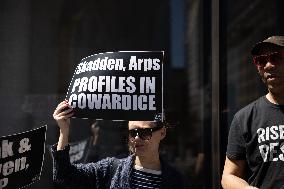 Protesters Demonstrate Outside Elite Law Firm Over Deal With Trump
