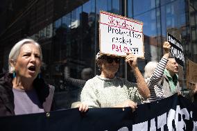 Protesters Demonstrate Outside Elite Law Firm Over Deal With Trump