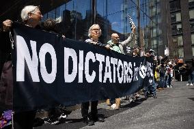 Protesters Demonstrate Outside Elite Law Firm Over Deal With Trump