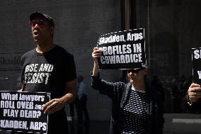 Protesters Demonstrate Outside Elite Law Firm Over Deal With Trump