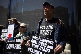 Protesters Demonstrate Outside Elite Law Firm Over Deal With Trump