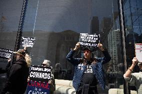 Protesters Demonstrate Outside Elite Law Firm Over Deal With Trump