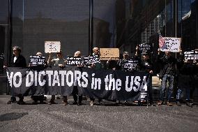 Protesters Demonstrate Outside Elite Law Firm Over Deal With Trump