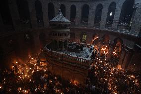 Palestinian Christians Celebrate Holy Fire In Jerusalem