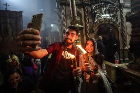 Palestinian Christians Celebrate Holy Fire In Jerusalem