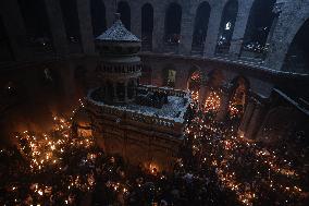 Palestinian Christians Celebrate Holy Fire In Jerusalem