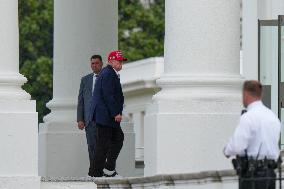Trump Returns To The White House After Golfing