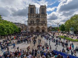 Faithful Gather at Notre-Dame Cathedral After the Death of Pope Francis - Paris