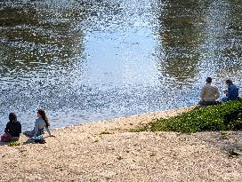Daily Life By The Danube In The German Town Of Regensburg, A UNESCO World Heritage City