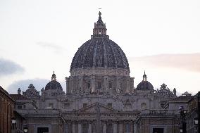People queue at St Peter Basilica to pay their respects to late Pope Francis - Rome