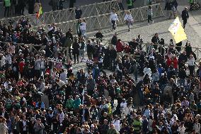 The faithful and priests wait on the steps of St Peter s Basilica for the Funeral of Pope Francis