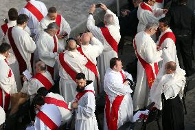 The faithful and priests wait on the steps of St Peter s Basilica for the Funeral of Pope Francis