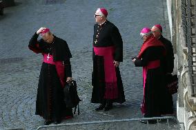 The faithful and priests wait on the steps of St Peter s Basilica for the Funeral of Pope Francis