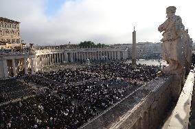 The faithful and priests wait on the steps of St Peter s Basilica for the Funeral of Pope Francis