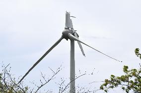 Wind turbine with fallen blade in northeastern Japan
