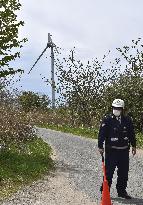 Wind turbine with fallen blade in northeastern Japan