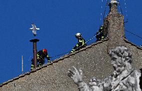 Firefighters Install Chimney On The Sistine Chapel For Papal Election - Vatican