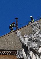 Firefighters Install Chimney On The Sistine Chapel For Papal Election - Vatican