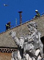 Firefighters Install Chimney On The Sistine Chapel For Papal Election - Vatican