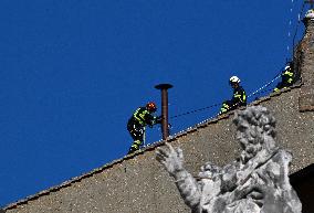 Firefighters Install Chimney On The Sistine Chapel For Papal Election - Vatican