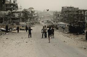 Children Play Soccer in Destroyed Buildings - Gaza